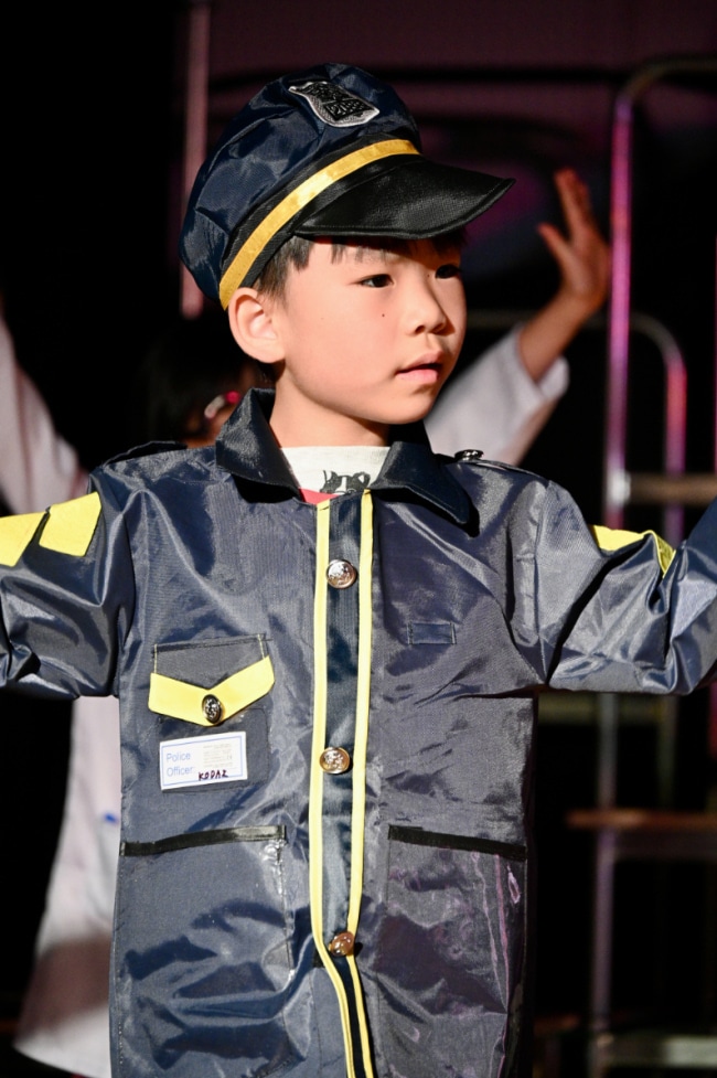 boy in police outfit